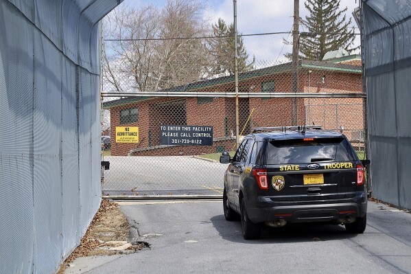 FILE - A Maryland State Police trooper vehicle sits outside the Victor Cullen Center, April 8, 2018, in Sabillasville, Md. A new lawsuit filed Thursday, Feb. 8, 2024, alleging child sexual abuse inside Maryland juvenile detention facilities brings the number of victims suing the state’s juvenile justice agency to 200. (Jennifer Fitch/The Herald-Mail via AP, File)