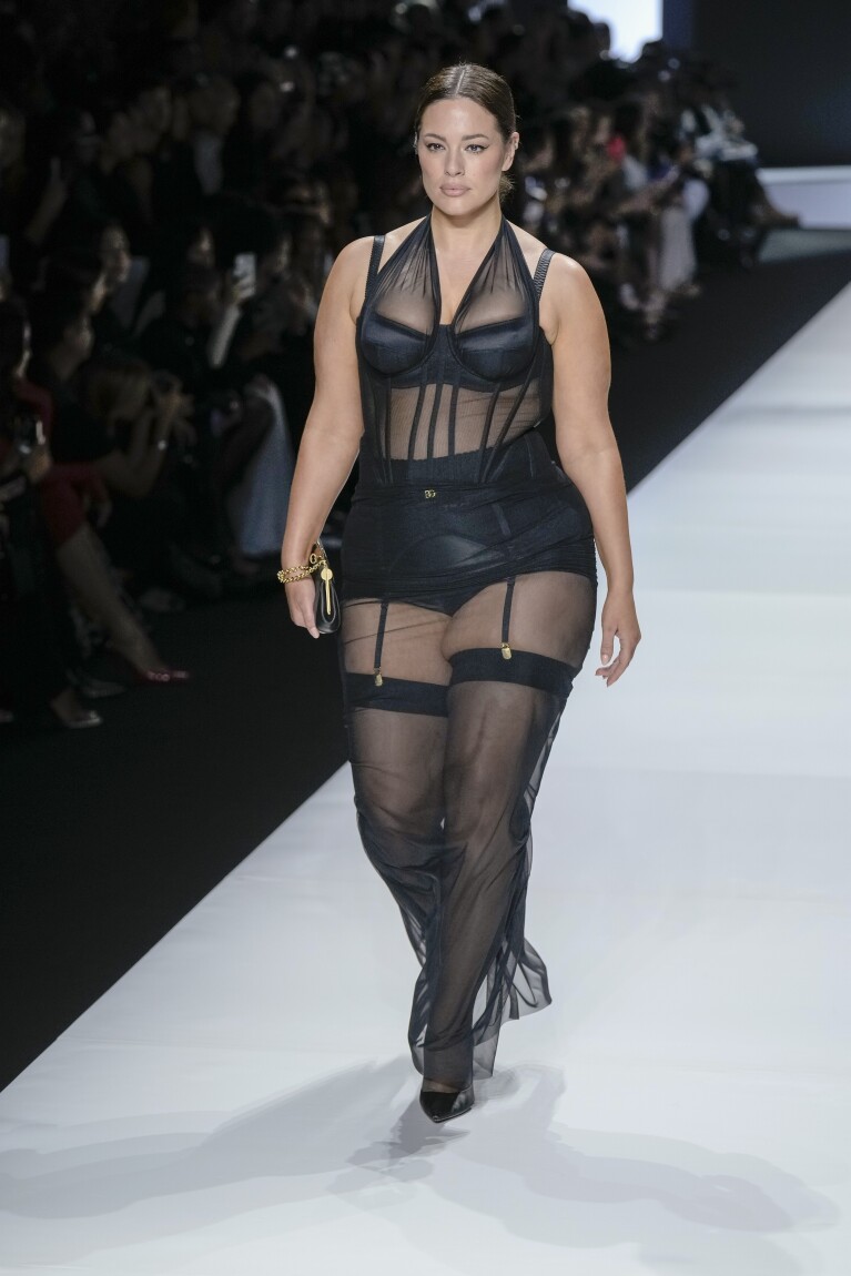 Ashley Graham wears a creation as part of the Dolce & Gabbana women's Spring Summer 2024 collection presented in Milan, Italy, Saturday, Sept. 23, 2023. (AP Photo/Antonio Calanni)