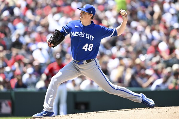 Kansas City Royals starting pitcher Ryan Yarbrough delivers during the third inning of a baseball game against the Cleveland Guardians, Sunday, July 9, 2023, in Cleveland. (AP Photo/Nick Cammett)