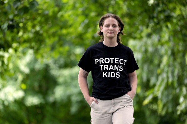Eli Givens walks in a park Wednesday, June 18, 2025, in Franklin, Tenn., after the Supreme Court upheld Tennessee's ban on gender-affirming care for transgender minors. (AP Photo/Mark Humphrey)