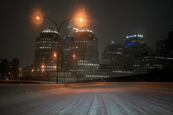 A snow-covered Interstate 71 is clear of cars north of Cincinnati, Monday, Jan. 6, 2025. (AP Photo/Carolyn Kaster)