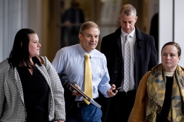 Rep. Jim Jordan, R-Ohio, center, and Republican staff attorney Steve Castor, second from right, arrive for a private interview with James Biden, the brother of President Joe Biden, at Thomas P. O'Neill House Office Building on Capitol Hill in Washington, Wednesday, Feb. 21, 2024. (APPhoto/Andrew Harnik)