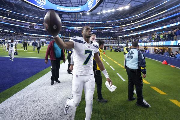 Seattle Seahawks quarterback Geno Smith heads off the field following an NFL football game against the Los Angeles Rams Sunday, Dec. 4, 2022, in Inglewood, Calif. The Seahawks won 27-23. (AP Photo/Marcio Jose Sanchez)