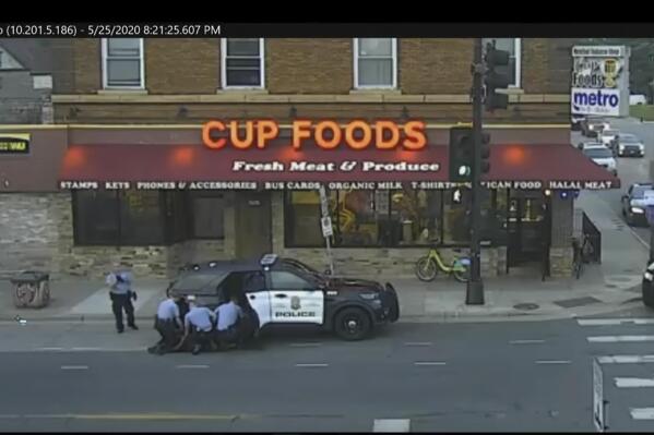 FILE - In this image from surveillance video, Minneapolis police Officers from left, Tou Thao, Derek Chauvin, J. Alexander Kueng and Thomas Lane are seen attempting to take George Floyd into custody in Minneapolis, Minn on May 25, 2020. Three former Minneapolis officers headed to trial this week on federal civil rights charges in the death of George Floyd aren't as familiar to most people as Chauvin, a fellow officer who was convicted of murder last spring. (Court TV via AP, Pool, File)