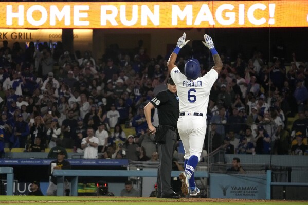 Martinez and Peralta homer back-to-back, helping Dodgers rally to
