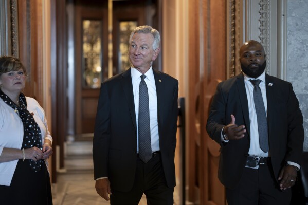 Sen. Tommy Tuberville, R-Ala., a member of the Senate Armed Services Committee, leaves the chamber as senators arrive for votes, at the Capitol in Washington, Wednesday, Sept. 6, 2023. Tuberville is delaying civilian and flag officer nominations in the Pentagon as he protests a Defense Department policy providing leave and reimbursement for service members who need to travel to get an abortion. (AP Photo/J. Scott Applewhite)