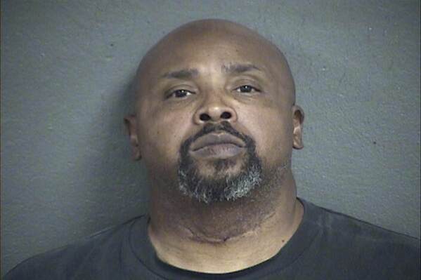 This booking photo provided by Kansas City, Kan., Police Department shows Gary Dion Davis. DNA evidence led to the arrest of Davis, Kansas City Police Chief Karl Oakman and Wyandotte County District Attorney Mark Dupree said Wednesday, Sept. 20, 2023. Davis is jailed on a $500,000 bond for two counts of second-degree murder, the Kansas City Star reported. (Kansas City, Kan., Police Department via AP)