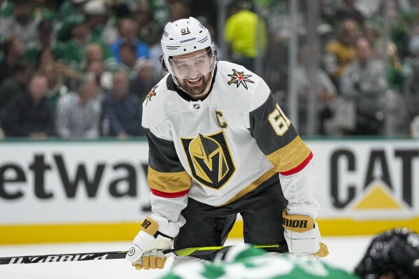 Vegas Golden Knights right wing Mark Stone looks on during the second period in Game 2 of an NHL hockey Stanley Cup first-round playoff series against the Dallas Stars in Dallas, Wednesday, April 24, 2024. (AP Photo/Tony Gutierrez)