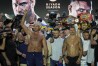Heavyweight boxers Britain's Tyson Fury, left, and Ukraine's Oleksandr Usyk stand on the stage during the weigh-in in Riyadh, Saudi Arabia, Friday, May 17, 2024, prior to their undisputed heavyweight championship fight on Saturday. (AP Photo/Francisco Seco)