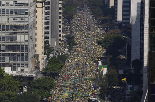 Supporters of Brazilian President Jair Bolsonaro gather at Paulista Avenue on Independence Day in Sao Paulo, Brazil, Tuesday, Sept. 7, 2021. (AP Photo/Andre Penner)