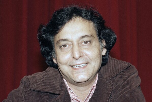 FILE- A May 22, 1984 file photo of Bengali actor Soumitra Chatterjee, taken during the presentation of the Indian film "Ghare-Baire"by  Bengali director Satyajit Ray at the 37th Cannes Film Festival in Cannes, France. Chatterjee, the legendary Indian actor with more than 200 movies to his name and famed for his work with Oscar-winning director Satyajit Ray, has died. He was 85. (AP Photo/Michel Lipchitz, File)
