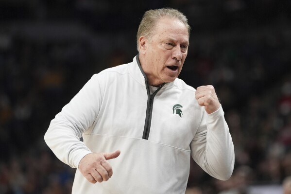 Michigan State head coach Tom Izzo gestures toward the team bench during the first half of an NCAA college basketball game against Purdue in the quarterfinal of the Big Ten Conference tournament, Friday, March 15, 2024, in Minneapolis. (AP Photo/Abbie Parr)