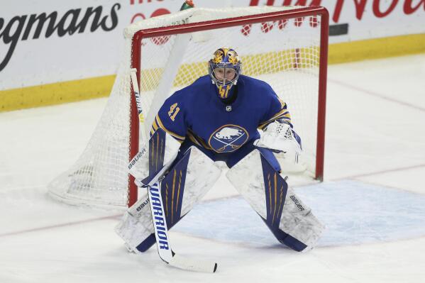 FILE - Buffalo Sabres goaltender Craig Anderson (41) stands in net during the third period of an NHL hockey game against the Philadelphia Flyers on Saturday, April. 16, 2022, in Buffalo, N.Y. Anderson put off retirement to re-sign with Buffalo on a one-year contract, Thursday, June 30, 2022. (AP Photo/Joshua Bessex, File)