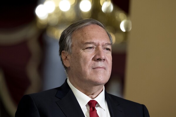 FILE - Former Secretary of State Mike Pompeo waits for a television interview at the Capitol in Washington on Nov. 7, 2023. The Biden administration has once again renewed taxpayer-funded protection for Pompeo and one of his top aides, who have been the target of persistent threats from Iran. (AP Photo/Amanda Andrade-Rhoades, File)