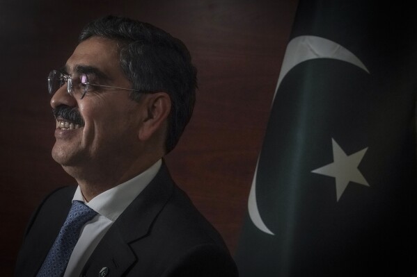 Pakistan's interim Prime Minister Anwaar-ul-Haq Kakar holds an interview during his visit for the United Nations General Assembly, Friday Sept. 22, 2023, in New York. Kakar said he expects parliamentary elections to take place in the new year, dismissing the possibility that the country’s powerful military would manipulate the results to ensure that jailed former premier Imran Khan’s party doesn’t win. (AP Photo/Bebeto Matthews)