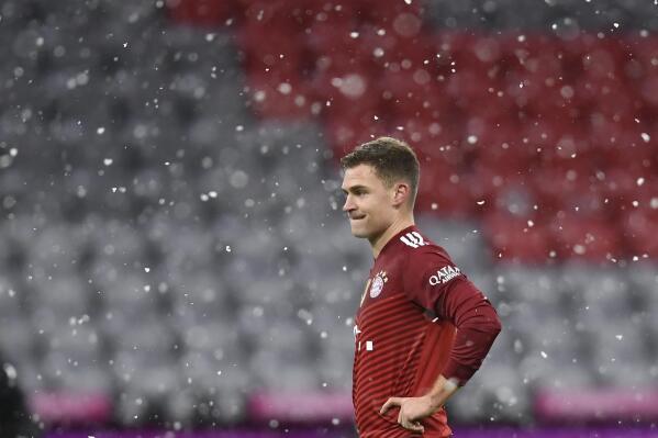 Bayern's Joshua Kimmich reacts during a German Bundesliga soccer match between Bayern Munich and Monchengladbach at the Allianz Arena in Munich, Germany, Friday, Jan. 7, 2022. (AP Photo/Andreas Schaad)