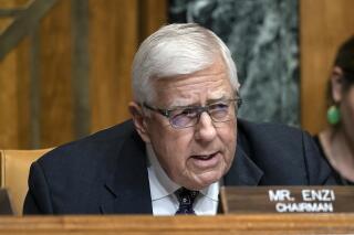 FILE - In this March 27, 2019, file photo, Sen. Mike Enzi, R-Wyo., chairman of the Senate Budget Committee, makes an opening statement on the fiscal year 2020 budget resolution, on Capitol Hill in Washington. Recently retired U.S. Sen. Mike Enzi of Wyoming died Monday, July 26, 2021. He was 77 years old. (AP Photo/J. Scott Applewhite, File)