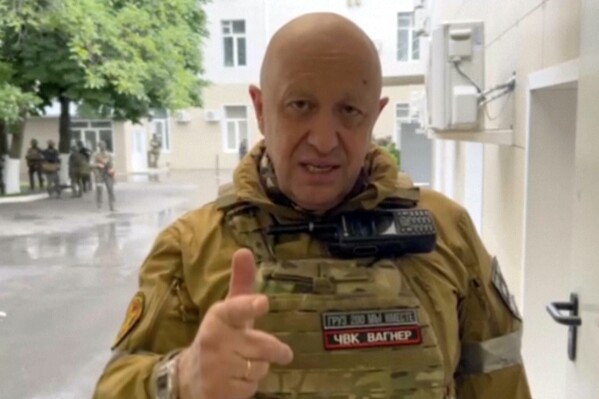 In this handout photo taken from video released by Prigozhin Press Service, Yevgeny Prigozhin, the owner of the Wagner Group military company, records his video addresses in Rostov-on-Don, Russia, Saturday, June 24, 2023. (Prigozhin Press Service via AP)