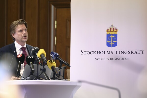 FILE - Judge Mans Wigen speaks during a press conference after the sentencing of Yahya Gungor, in the Stockholm district court, Thursday, July 6, 2023. A Swedish appeals court on Wednesday, Sept. 20 has maintained a 4.5 years prison sentence for a Turkish man for attempted aggravated extortion, weapons possession and attempted terrorist financing, saying he was acting on behalf of the outlawed Kurdistan Workers’ Party. However, the court said Yahya Gungor should not be deported after serving his time, citing his ties with the PKK. (Oscar Olsson//TT News Agency via AP, file)