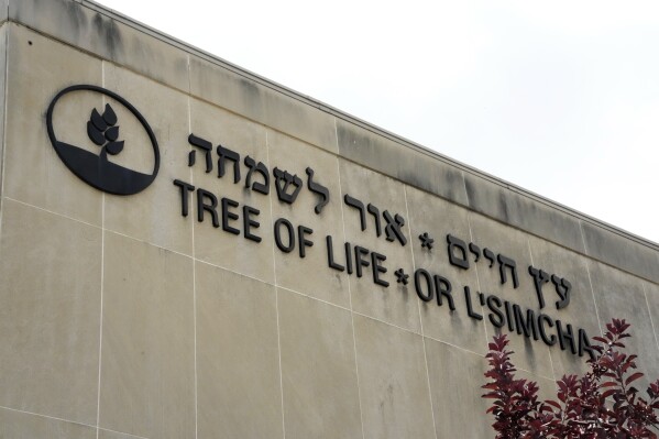FILE - This is the signage on the dormant landmark Tree of Life synagogue is pictured in Pittsburgh's Squirrel Hill neighborhood, July 13, 2023. (AP Photo/Gene J. Puskar/File)