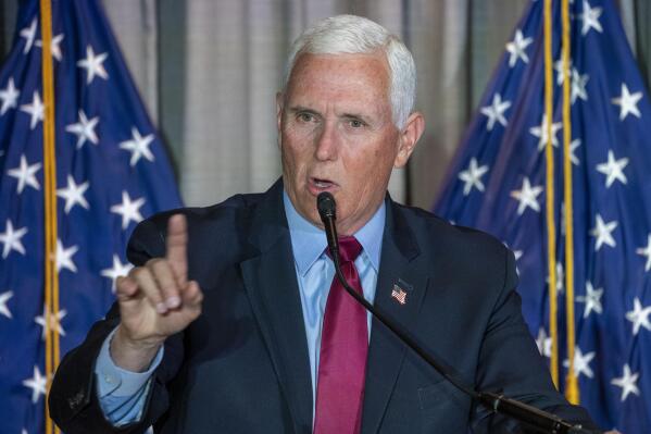 Former Vice President Mike Pence pauses while speaking at a Coolidge and the American Project luncheon in the Madison Building of the Library of Congress, Thursday, Feb. 16, 2023, in Washington. (AP Photo/Alex Brandon)