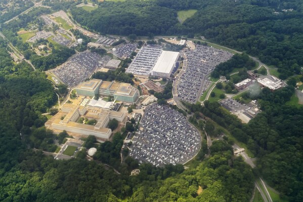 The Central Intelligence Agency (CIA) Headquarters, is seen from a commercial airliner as it files over the CIA campus in Langley, Va., July 24, 2023. (AP Photo/Pablo Martinez Monsivais, File)