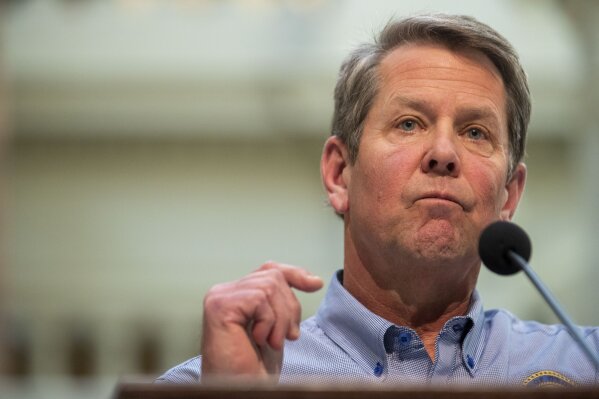 Georgia Gov. Brian Kemp speaks during a news conference at the Capitol building in Atlanta, Monday, April 27, 2020, during the coronavirus outbreak. Kemp did not say whether he would extend the shelter-in-place order that is set to expire at midnight Thursday. (Alyssa Pointer/Atlanta Journal-Constitution via AP)