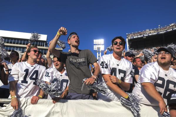 Penn State fans cheer against Ball State during an NCAA college football game in State College, Pa., on Saturday, Sept. 11, 2021. Penn State defeated Ball State 44-13.(AP Photo/Barry Reeger)
