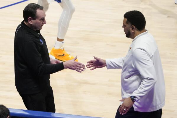 Pittsburgh coach Jeff Capel, right, shakes hands with Duke coach Mike Krzyzewski after an NCAA college basketball game Tuesday, March 1, 2022, in Pittsburgh. Duke won 86-56. (AP Photo/Keith Srakocic)