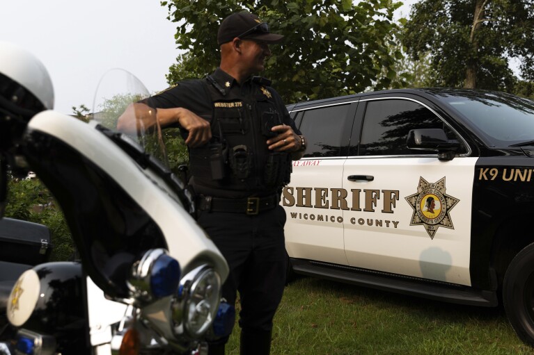 A Wicomico County police car appears on display during National Night Out, Tuesday, August 1, 2023, in Salisbury, Md. Data from the sheriff鈥檚 office shows that over the past eight years, children have been taken from Wicomico County schools to the emergency room for psychiatric evaluations at least 750 times. (APPhoto/Julia Nikhinson)